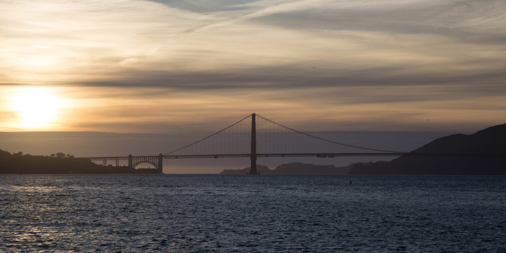 Sunset over Golden Gate Bridge - Travel for a Living